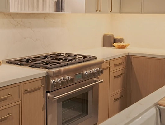 oven range inside warm, modern kitchen