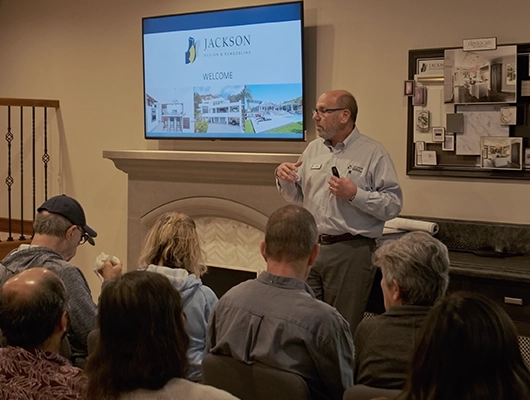 man giving a remodeling seminar talk